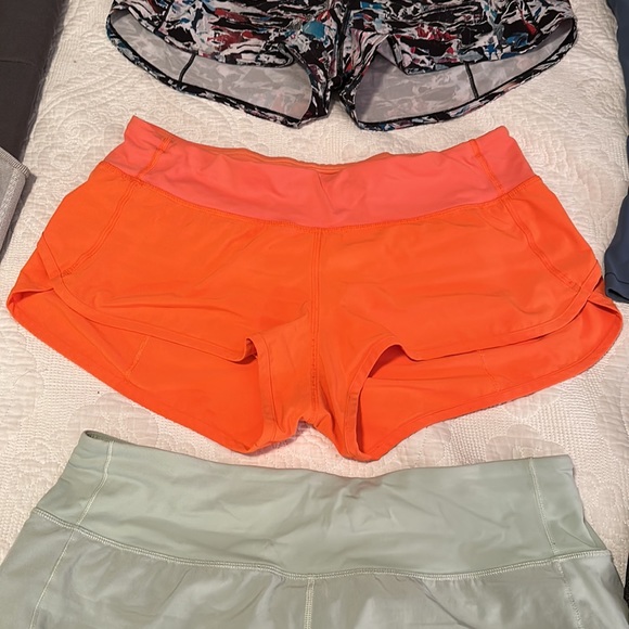 Lululemon speed shorts Sz 8 orange - Picture 1 of 4
